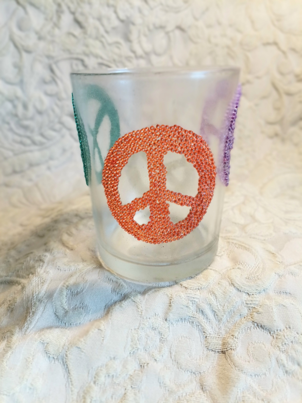Frosted Glass With Beaded Peace Motifs